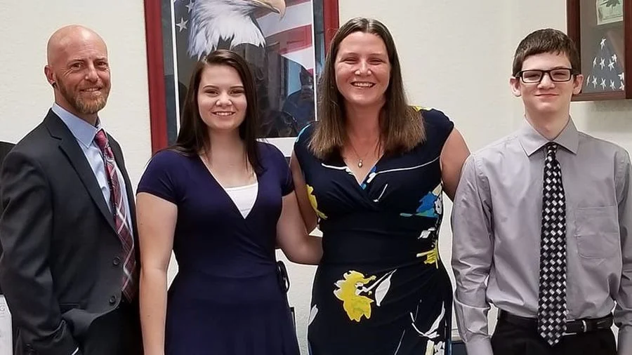 From left, Ron Flaville, daughter Tyler Trayer, wife Kellie Flaville, and son Lane Trayer. Not pictured, their eldest son, Caleb Flaville, who is in the Marines.